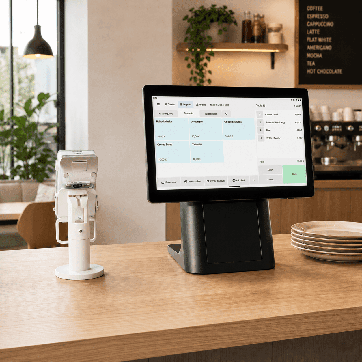 Pay2Easy POS terminal and card reader on a café counter
