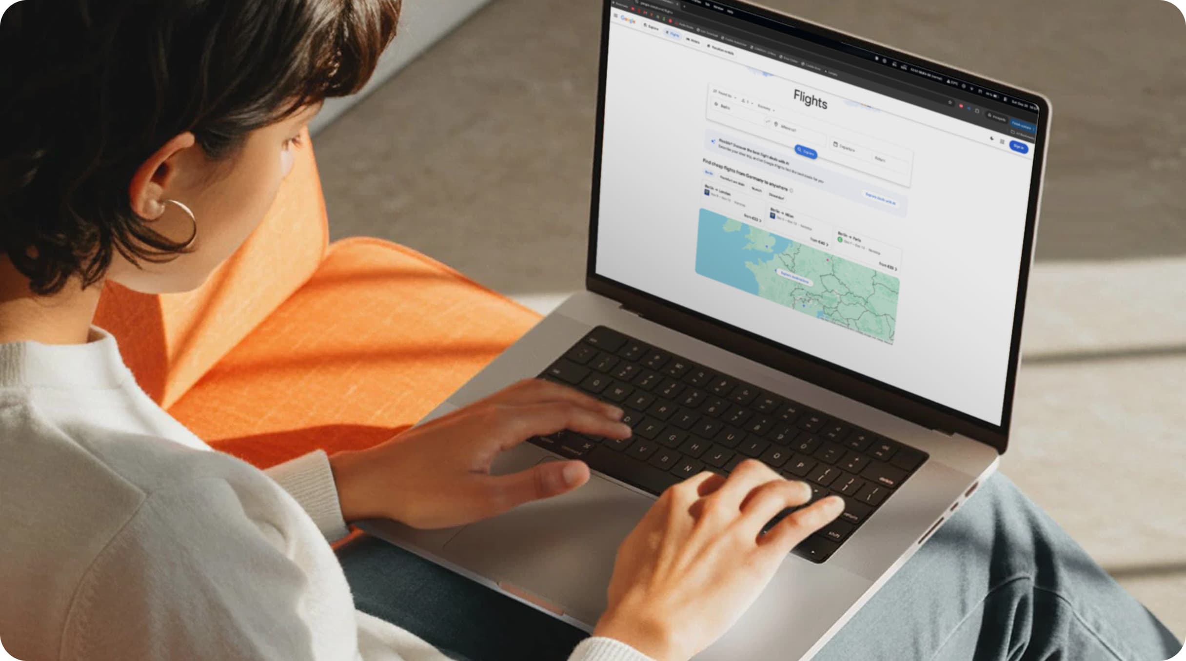 Person completing an online payment on a laptop